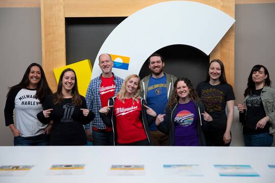Core creative team members wearing Milwaukee gear