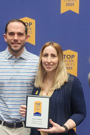 Core team members at top places to work award show