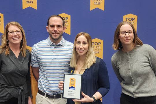 Core team members at top places to work award show