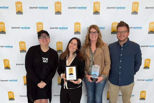 Core team members at top places to work award show