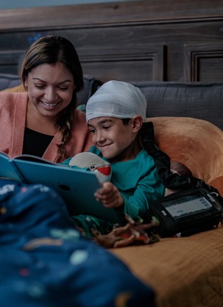 woman in the hospital using natus technology