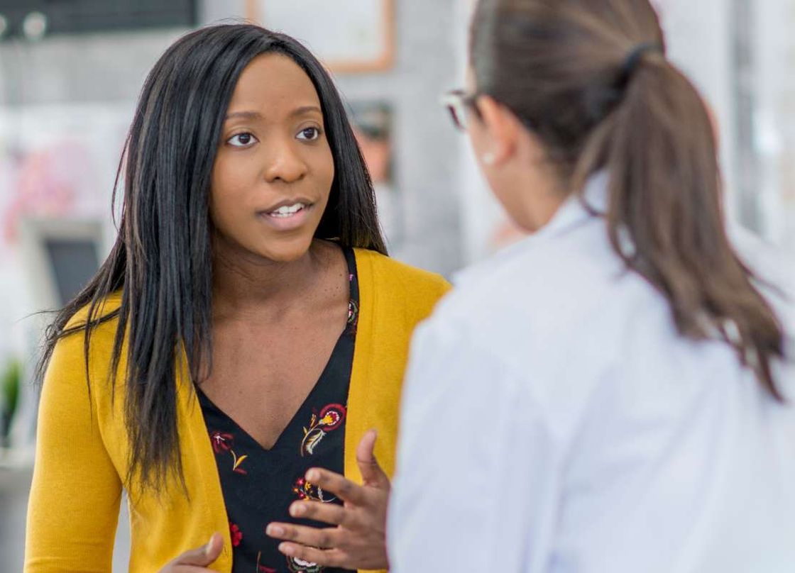 woman talking with her healthcare provider