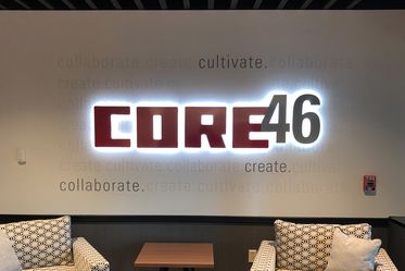Backlit "Core46" wall graphic in interior space