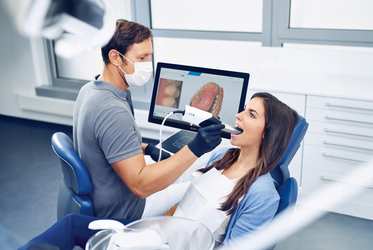 woman getting dental work done