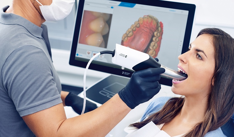 woman with her dentist using primescan