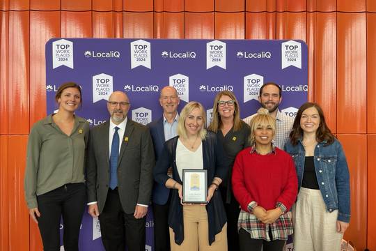 Core team members at top places to work award show