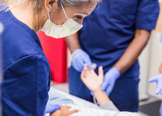 nurse administering treatment in fast environment