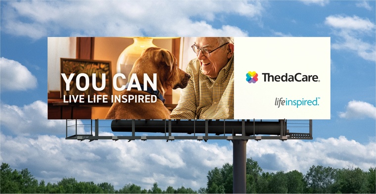 ThedaCare Billboard featuring dog and old man with text "YOU CAN LIVE LIFE INSPIRED"