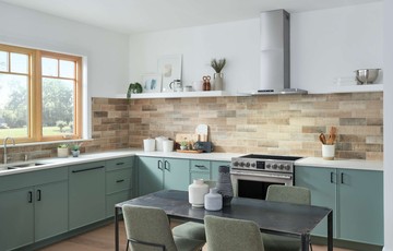 A kitchen scene with a Broan vent above the range