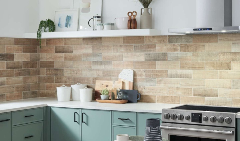 A kitchen scene with a Broan vent above the range