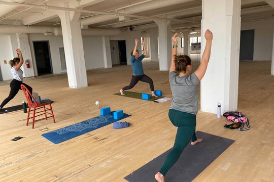Core team members doing yoga
