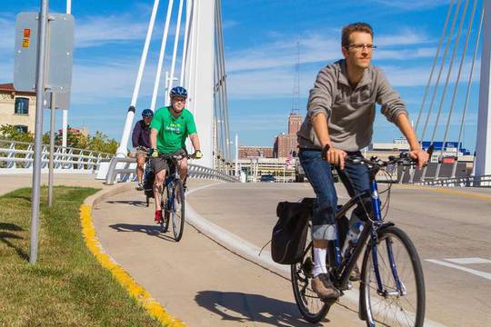 Core team members riding bikes outside